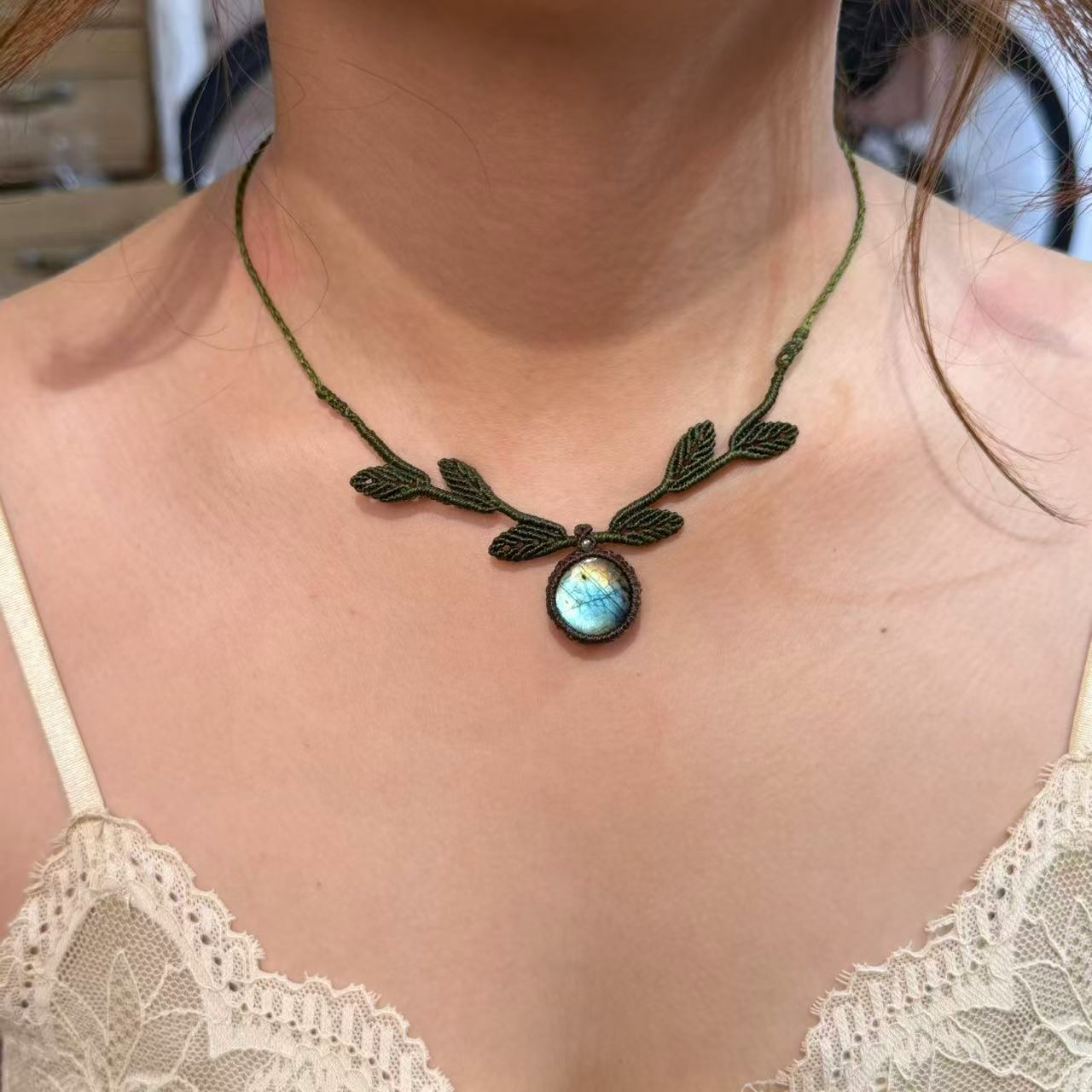 Necklace crafted with leaf weaving design